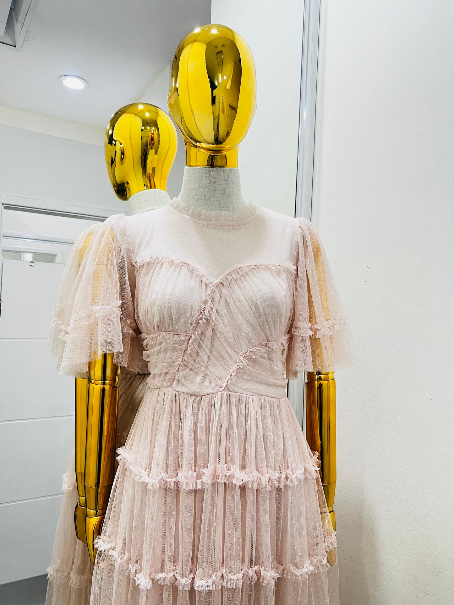 Vestido rosa viejo con olánes