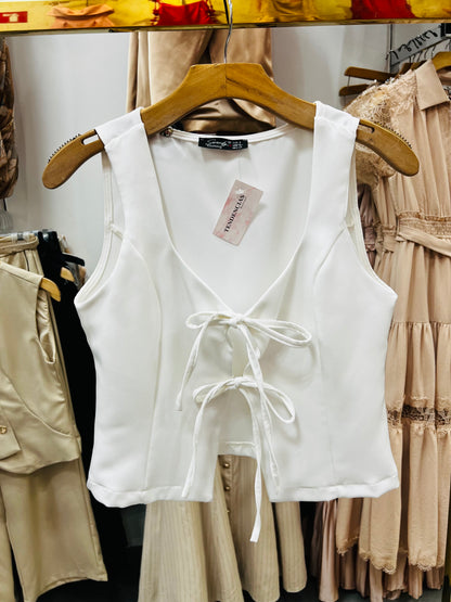 Blusa sin mangas con moños