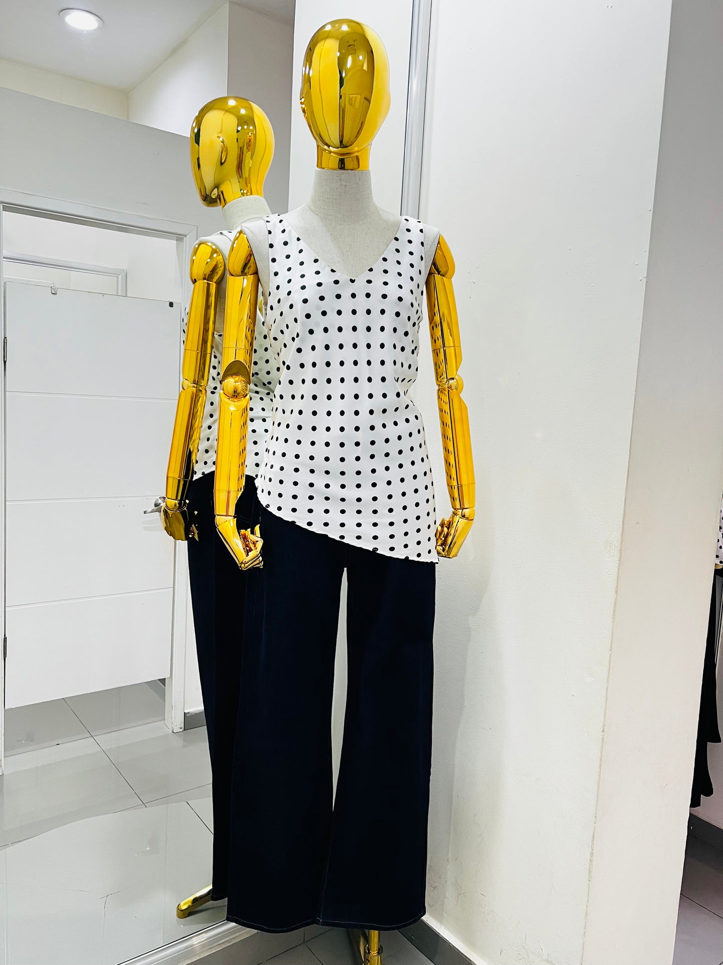 Blusa satín con puntos