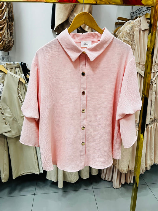 Blusa rosa con botones