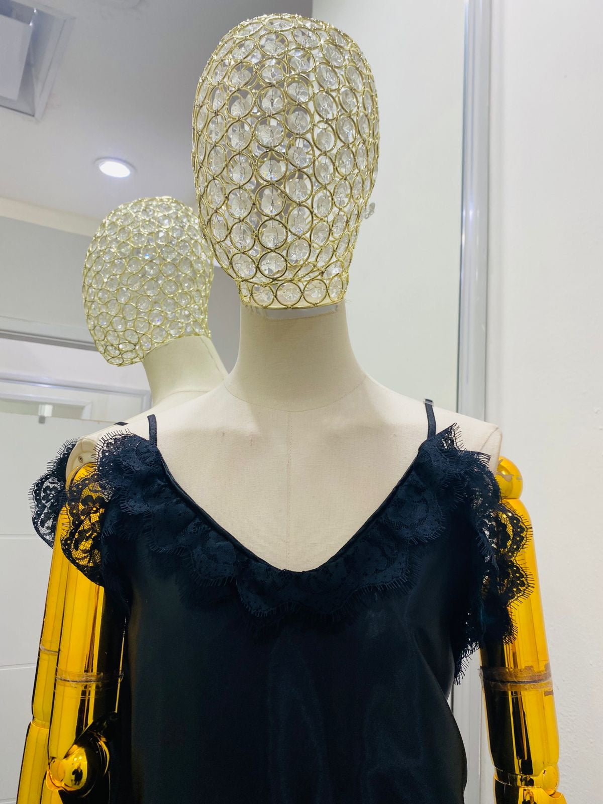 Blusa unitalla de satín con encaje