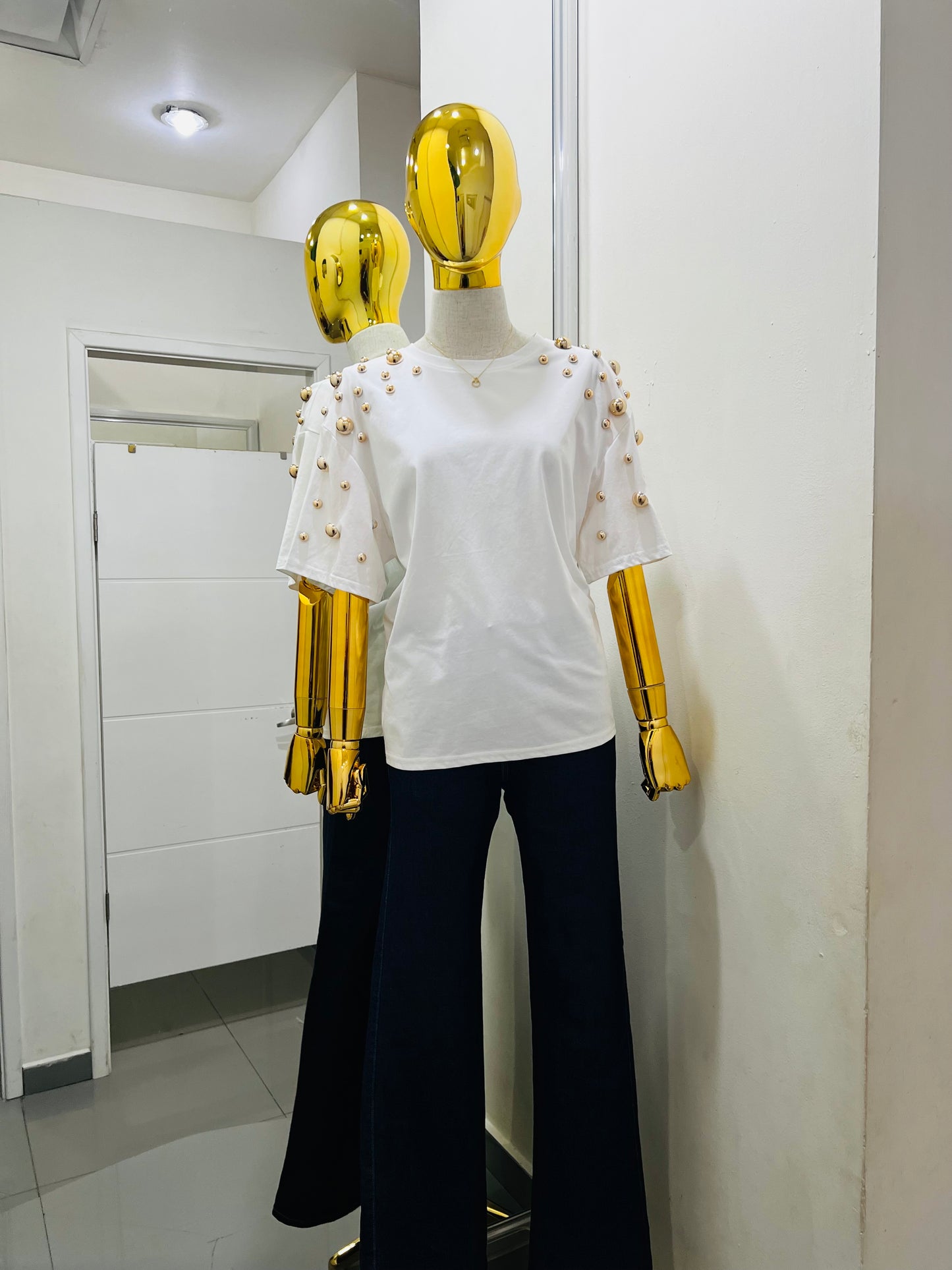 Blusa con detalles dorados