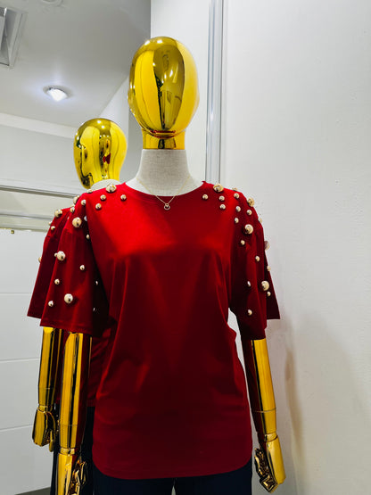 Blusa con perla dorada