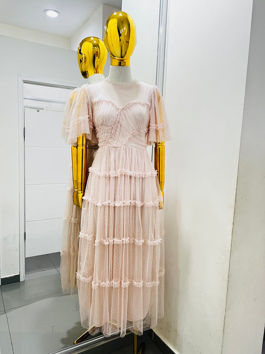 Vestido rosa viejo con olánes