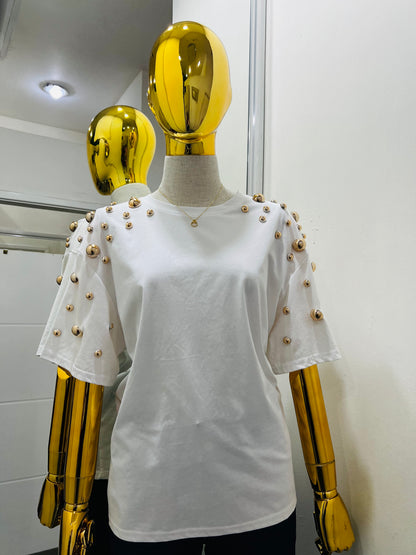 Blusa con detalles dorados