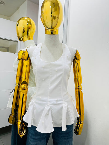 Blusa blanca con perlas