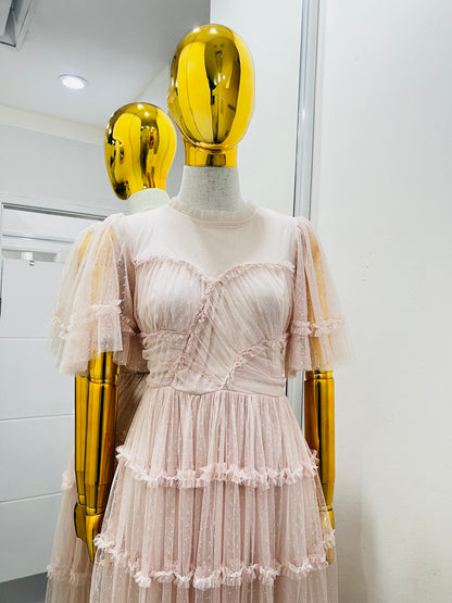 Vestido rosa viejo con olánes