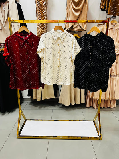 Blusa satín punteada