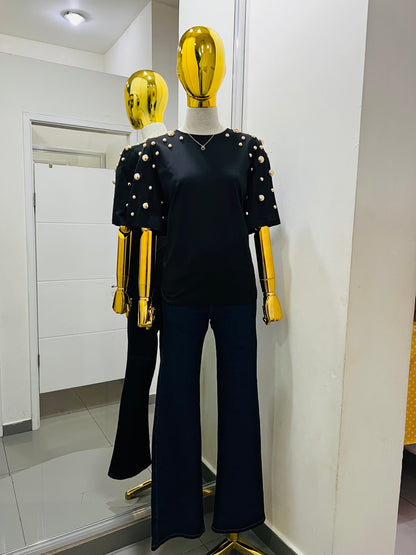Blusa con perla dorada