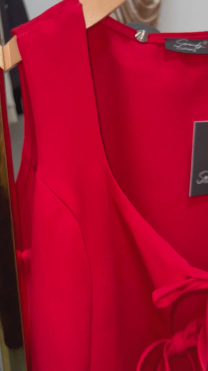 Blusa sin mangas con moños